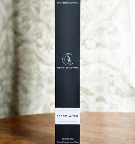 Hand-dipped incense sticks by Moonstone Rituals in Forest Witch, showing the eco-friendly tray-style packaging.