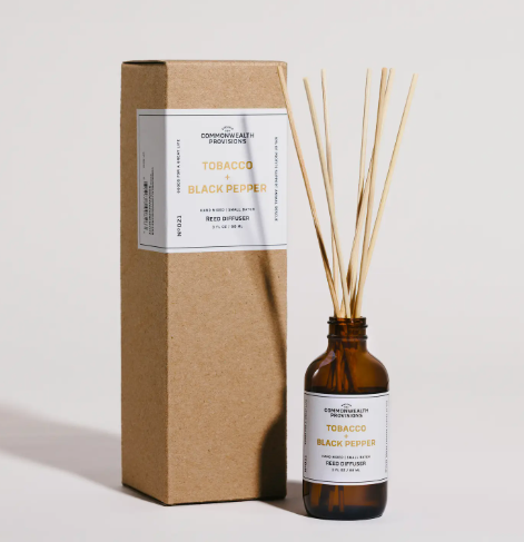 A 3 fl oz tobacco and black pepper scented home fragrance diffuser in a rustic kraft box.