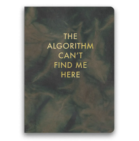 A medium-sized journal with a faux vintage cover and gold lettering that reads "The Algorithm Can't Find Me Here".