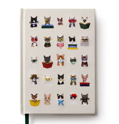 A blue fabric journal with playful embroidered cats wearing glasses and accessories, featuring 240 lined pages.