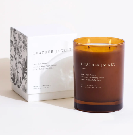 Discover the Leather Jacket 2-Wick Candle by Brooklyn Candle Studio, presented alongside its white textured gift box.