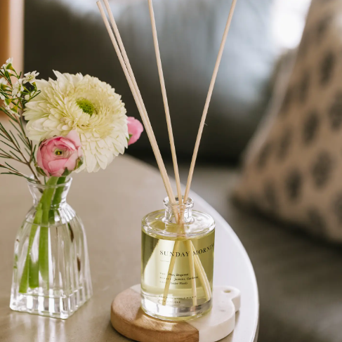 Transform your workspace or vanity into a calming oasis with a luxury, flame-free botanical room perfume designed to gently radiate complex floral oils.
