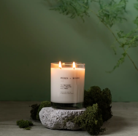 Nature-inspired aromatic candle with sage and lavender essential oils, perfect for minimalist home decor.