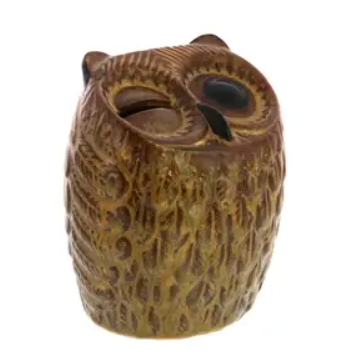 A charming brown ceramic owl bank with a glossy finish and a wide-eyed, friendly expression.