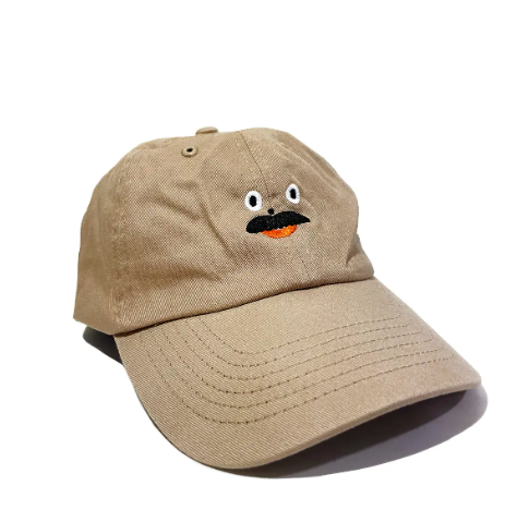 Kristina Micotti tan Dad hat featuring white embroidery and an adjustable strap, a perfect gift for any daddy.