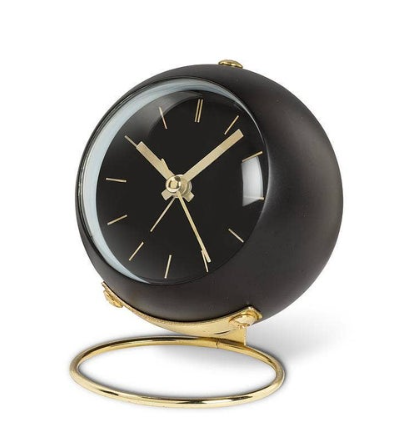 A sleek and modern ball alarm clock by Abbott featuring a minimalist loop stand in a sophisticated black finish.