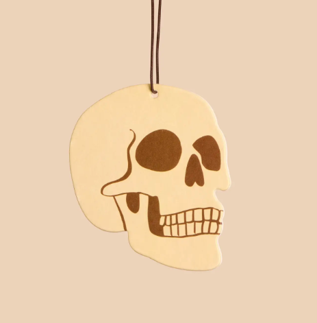 Close up of the unique and fun air freshener shaped like a skull with a surprising cola aroma.