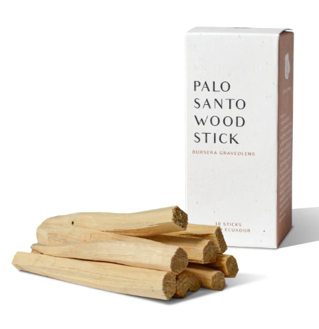 A bundle of natural Palo Santo sticks on a solid background, showcasing their clean, rustic look and texture.