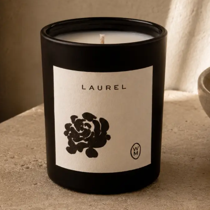 Bring the crisp, earthy elegance of a morning garden indoors with the refined glow of the Wilkin & May Laurel Luxury Candle.