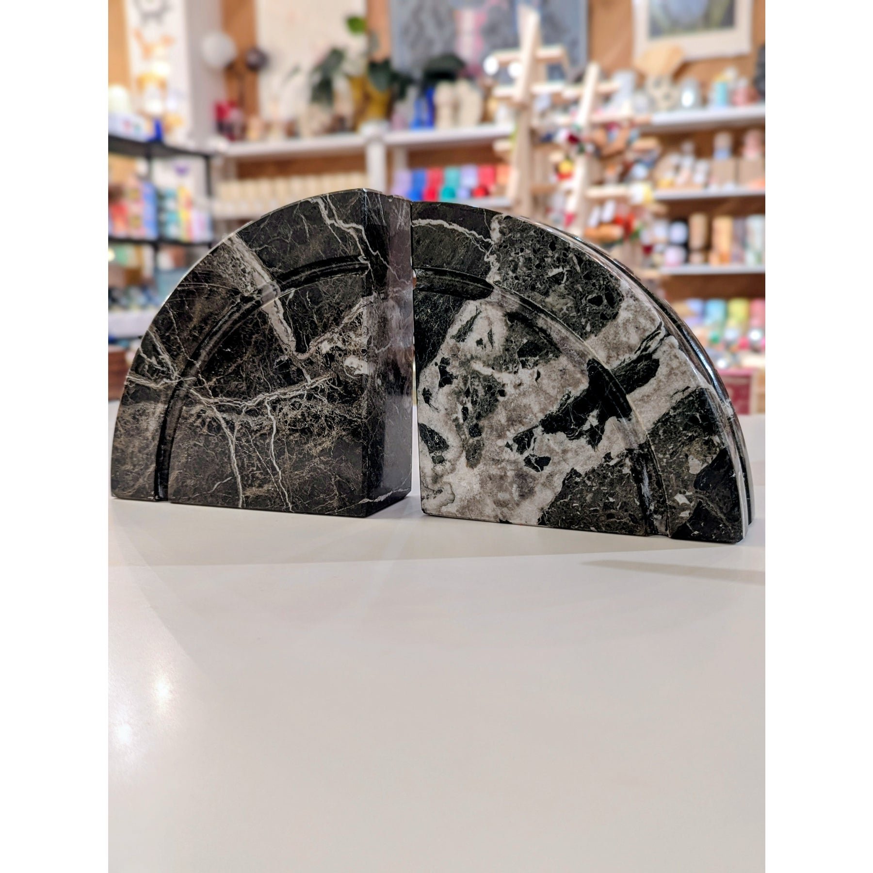 1980s-italian-postmodern-black-marble-semi-circle-bookends-9561.jpeg