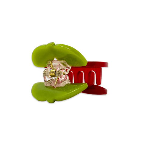 The Jenny Lemons Mini Maraschino Cherries Hair Claw, viewed from the side, highlighting its small size, secure grip, and unique handmade details, perfect for taming flyaways.