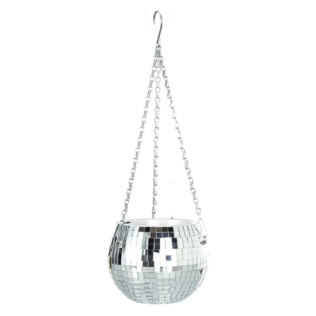 Transform your room into a radiant oasis! The Nomatiq Disco Ball Planter in sunlight casts captivating light patterns, making it the ultimate mood-enhancing decor for your home.