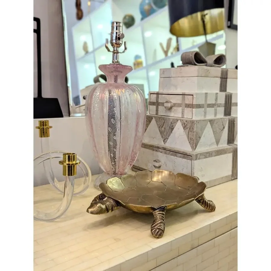 Whimsical brass turtle trinket dish styled on entryway console