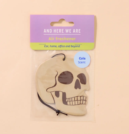 A Halloween Skull hanging air freshener with a sweetly carbonated cola aroma.