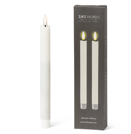 Showcase elegant Scandinavian styling with the Abbott S/2 Sand LED Taper Candle set, featuring a realistic flickering flame on a sleek, neutral wax pillar next to its box.