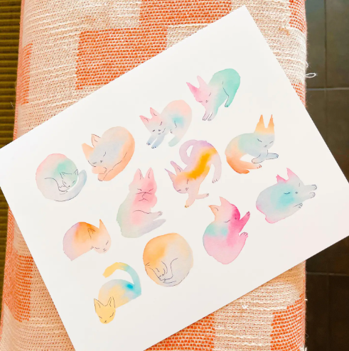 An 8x10 art print of watercolor cats in multitude of colors and illustration style.