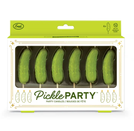 The gift-ready window box packaging for the Pickle Party Candles by Fred & Friends, showcasing gold foil accents and a fun green display.