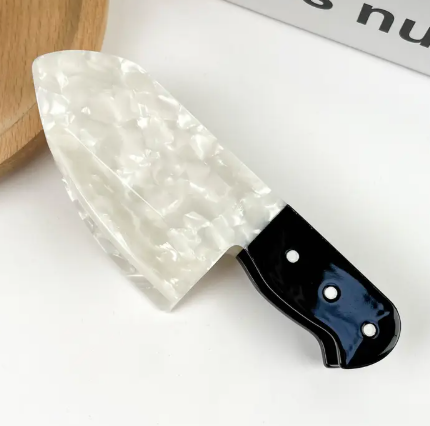 Edgy knife-themed hair accessory by TheDivaSoap, perfect for true crime fans and horror movie lovers.