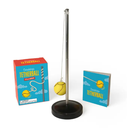Bring the playground home with the Desktop Tetherball: It's A Wrap! kit. This vibrant, playful set includes everything you need to start the game right on your desk.