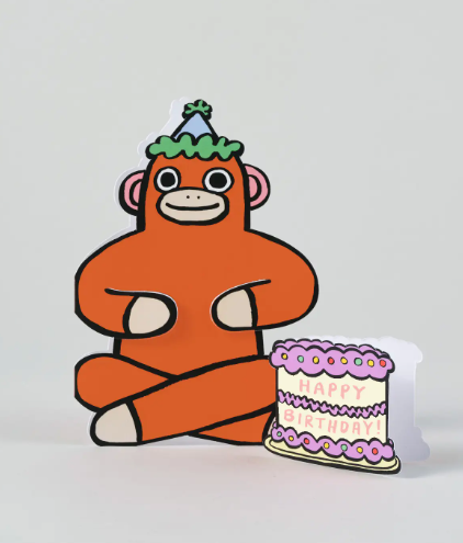 An interactive birthday card featuring a die-cut monkey and a separate mini card.