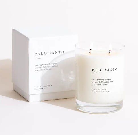The elegant Brooklyn Candle Studio Palo Santo Classic 2-Wick Candle, shown in its screenprinted glass tumbler and white gift box.