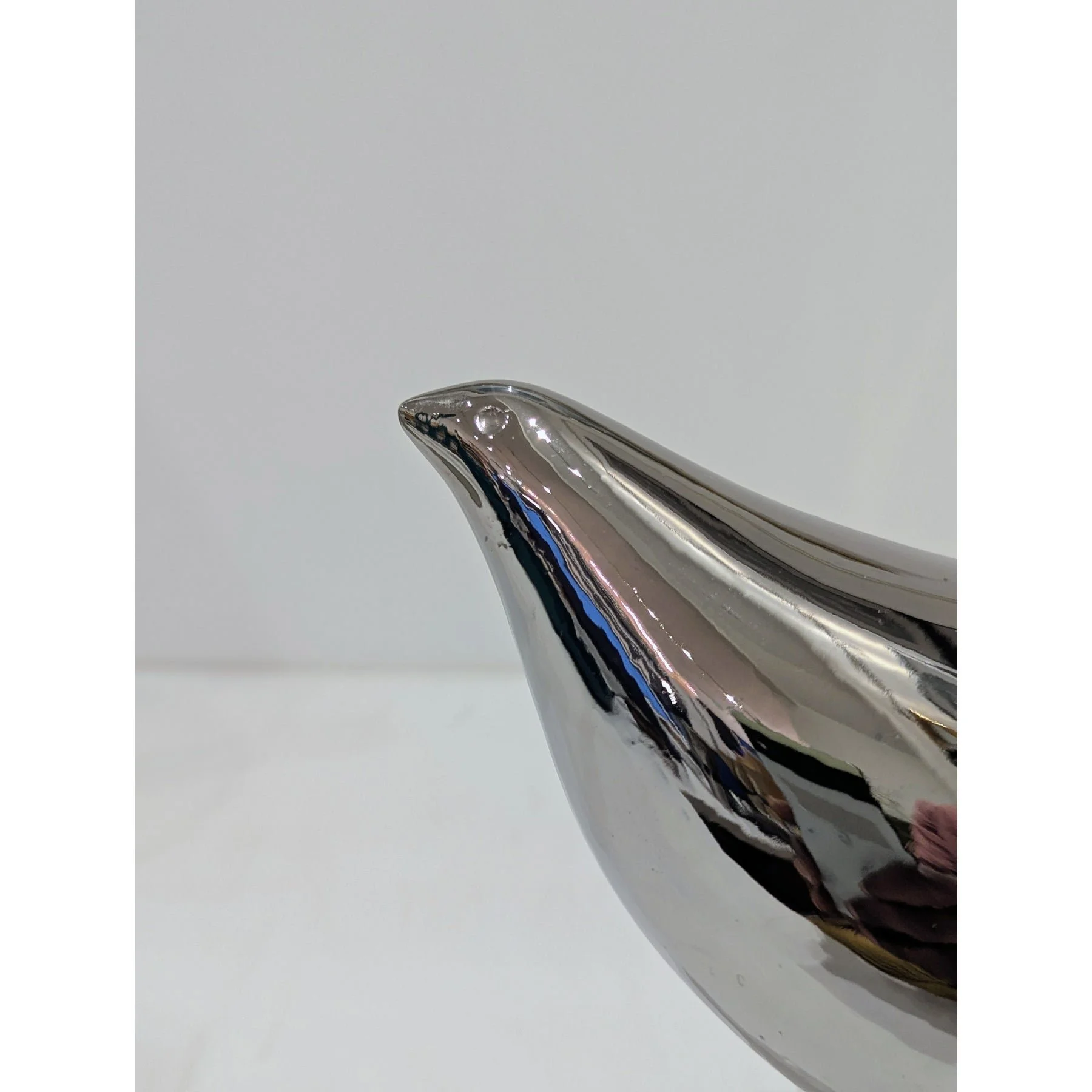 raymor-silver-ceramic-bird-sculpture-on-white-marble-base-1773.jpeg