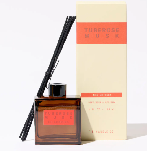 Highlight the gift-ready packaging of the P.F. Candle Co. Tuberose Musk Hi-Fi Reed Diffuser set with its custom glass vessel and premium paper box.