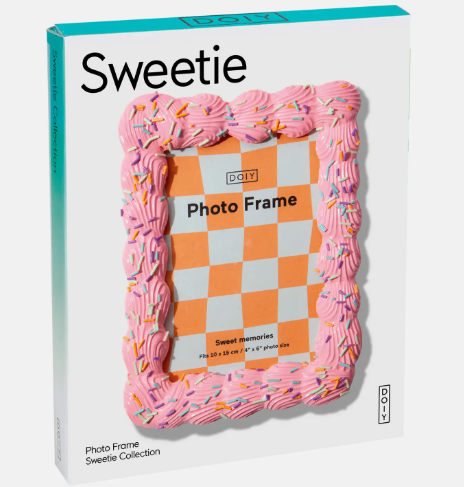 Gift a unique home accessory with a glossy pink frosting-inspired picture frame packaged beautifully in a signature Sweetie Collection gift box.