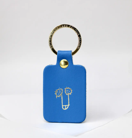 Cornflower leather willy keyring with a gold-plated ring, a humorous and high-quality novelty keychain.