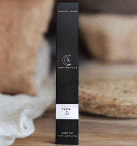 Hand-dipped charcoal incense sticks by Moonstone Rituals in Santal & Fig, showing the eco-friendly tray-style packaging.