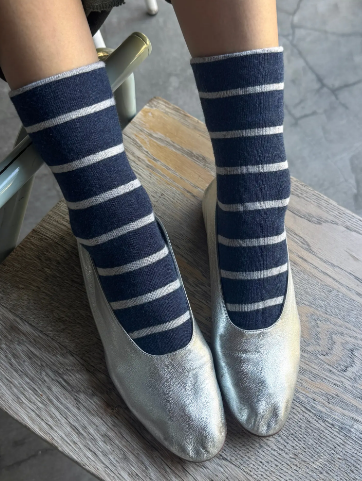 Add a sophisticated touch to your everyday look with the Marine Wally Socks by Le Bon Shoppe, styled elegantly with metallic footwear.