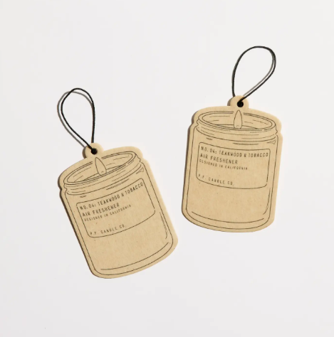 Candle Co. air freshener featuring a minimalist design and signature typography for the Teakwood & Tobacco scent.