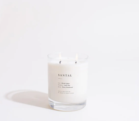 A double-wicked Santal candle, providing a long 70-hour burn time with sophisticated notes of cypress and sandalwood.