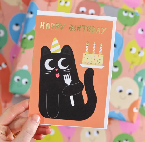 A colourful and whimsical cat-themed birthday card by Elliot Kruszynski with elegant gold foil detailing.