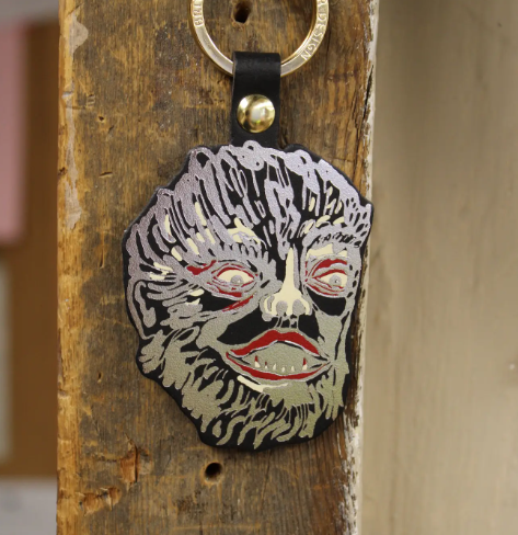 Bring artisan style to your keys with the silver-detailed Leather Werewolf Key Ring by Ark Colour Design.