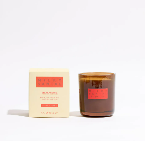 Hand-poured 13 oz double-wick soy candle by P.F. Candle Co. in an elegant gift box, featuring creamy santal notes.