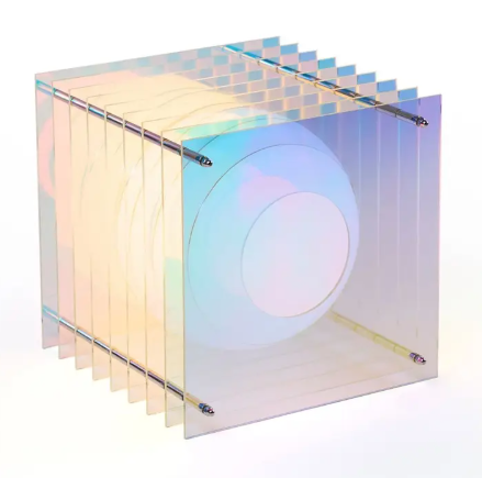 An iridescent Dreamy colorway of the LớP Small Square Light by BANG, capturing shifting rainbow reflections.