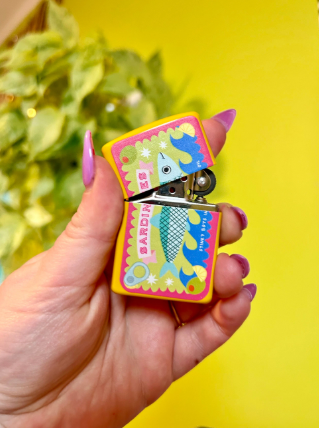 Sardine Lighter by The Peach Fuzz, showcasing the unique design and refillable feature.