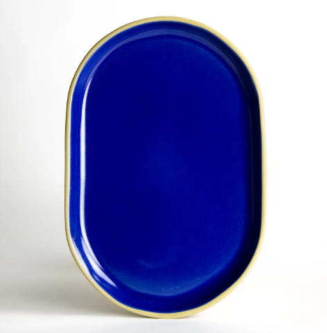 Elevate your kitchen or tabletop organization with the artisan-made Brookline Medium Tray by Emerson Creek Pottery in colorful American Blue.