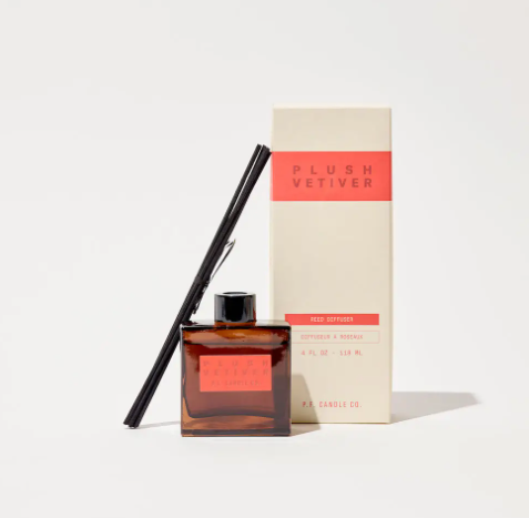 A view of the Plush Vetiver Hi-Fi Diffuser next to its premium gift box, emphasizing the quality packaging and making it an ideal upscale gift.