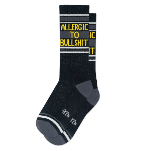 Keep your feet cozy in American-made novelty athletic socks that showcase a sporty striped style and a funny, no-nonsense statement text across the calf.