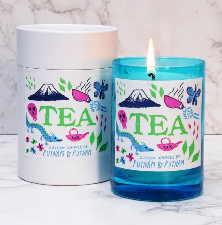 A premium 40-hour burn time soy wax candle with a fresh tea fragrance, made in the United States.