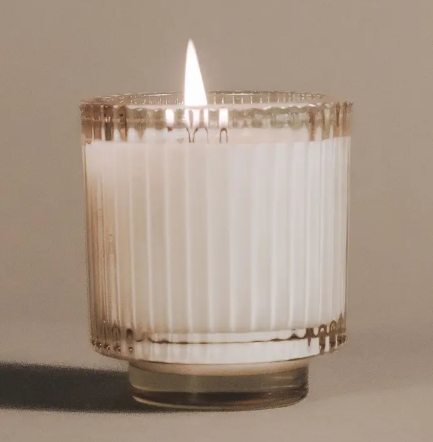 The Elsewhere Candle collection showcasing Palo Santo's unique fragrance scent profile and sustainable glass packaging.