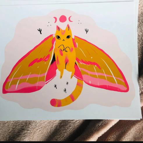 An effervescent art print featuring the Pink Elephant Moth Cat with glowing pink and orange wings against a light pink background, ready to bring bold color to your home decor.