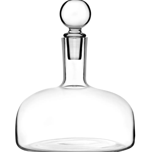 An oversized 98oz crystal decanter, featuring a chic, rounded silhouette for sophisticated bar styling.