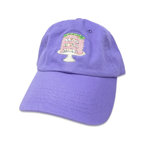 Embrace sweet style with the Jenny Lemons Confetti Cake Embroidered Hat, featuring a whimsical cake design with colorful sprinkles on a soft pastel cap.