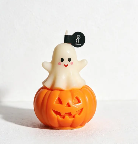Create a welcoming Halloween atmosphere with the Ghost Pumpkin Candle Style 3 by CouldNook, perched atop a classic carved jack-o'-lantern.