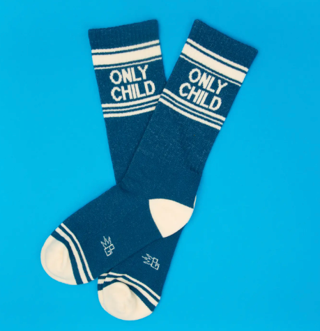 A pair of American-made cotton blend athletic socks with a playful design celebrating independence.