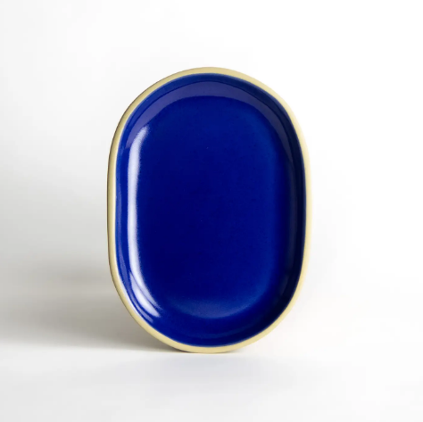 Add a pop of coastal elegance to your home with the handcrafted Brookline Small Tray by Emerson Creek Pottery in rich American Blue.