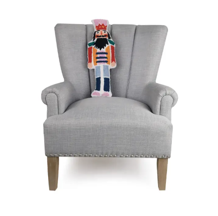 Nutcracker Shaped Hook Pillow by Peking Handicraft - Festive Holiday Accent on chair.